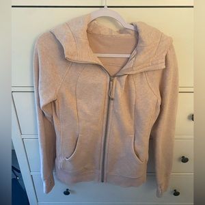 Light pink Lululemon zip up. Size 6